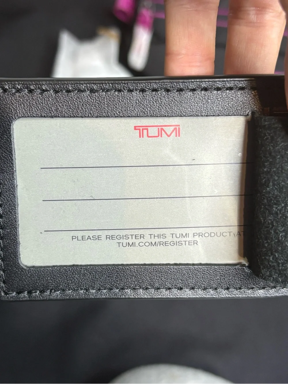 Tumi Black Travel Pouch with Pink Accents